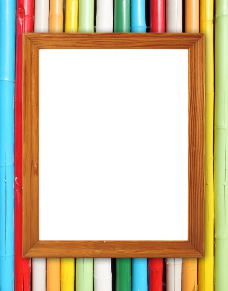 Blank wood frame on colorful bamboo wall — Stock Photo, Image