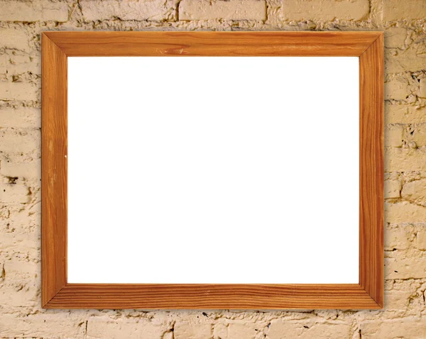 Blank wood frame on brick stone wall — Stock Photo, Image