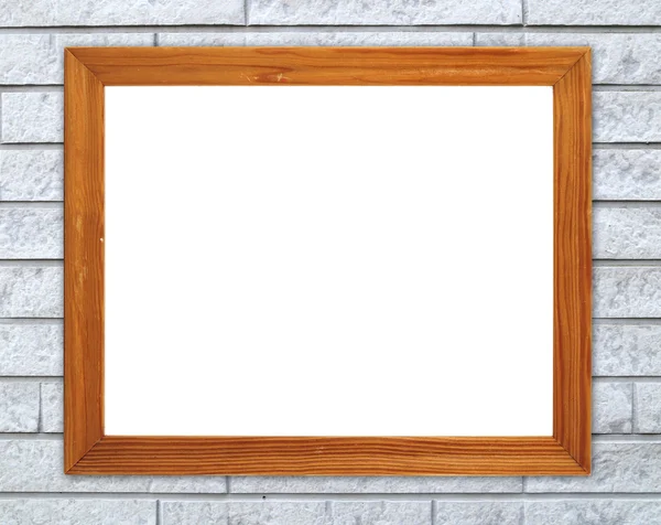 Blank wood frame on brick stone wall — Stock Photo, Image