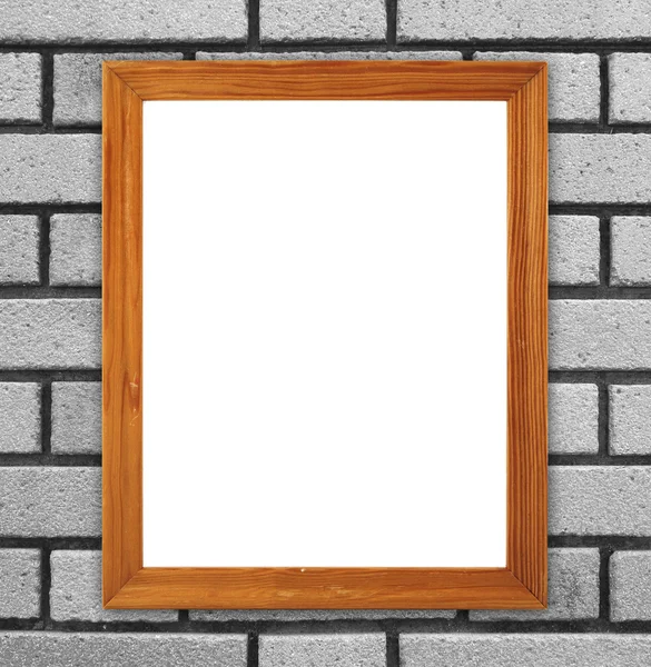 Blank wood frame on brick stone wall — Stock Photo, Image