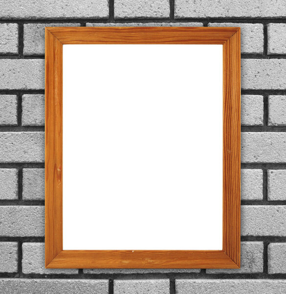 Blank wood frame on brick stone wall background
