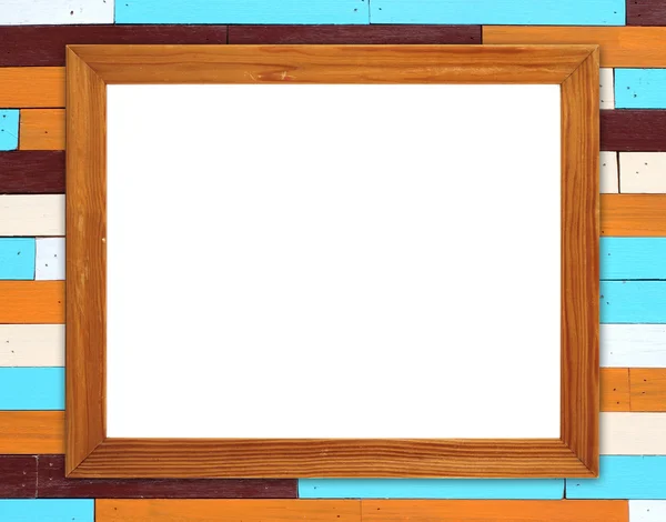 Leeg frame van hout op kleurrijke houten muur achtergrond — Stockfoto