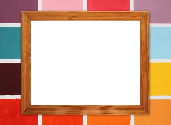 Puste rama z drewna na tle kolorowe ściany drewniane — Zdjęcie stockowe