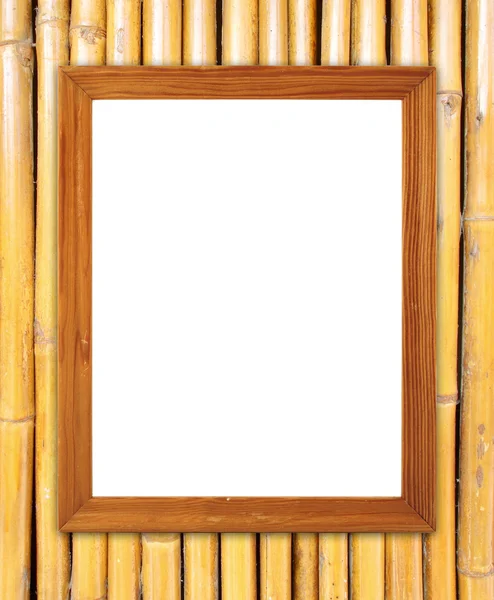 Marco de madera en blanco en la pared de bambú —  Fotos de Stock
