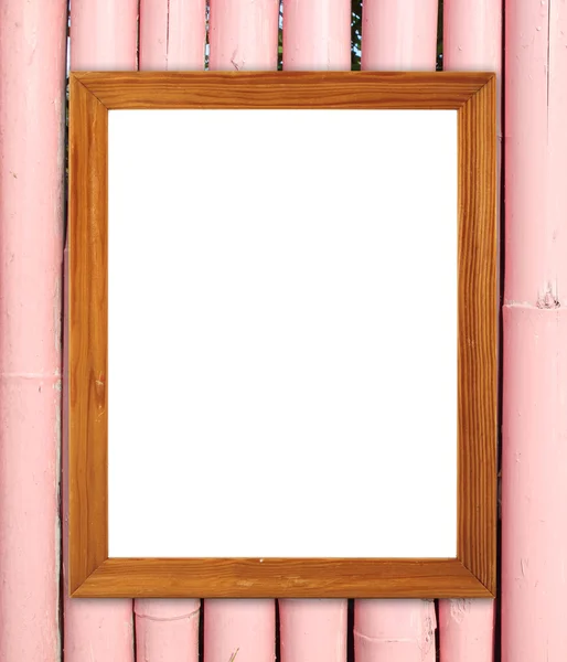 Blank wood frame on bamboo wall — Stock Photo, Image