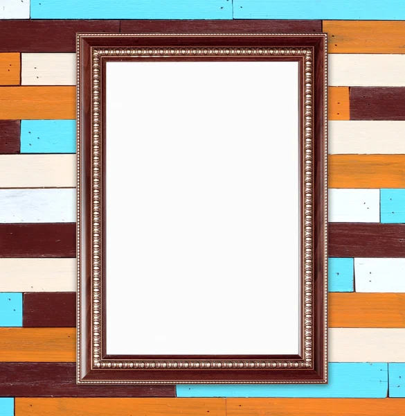 Blank wood frame on colorful wood wall background — Stock Photo, Image