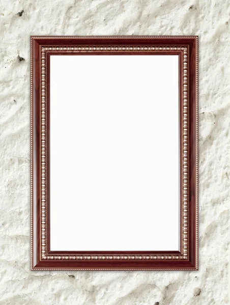 Blank wood frame on stone cement wall — Stock Photo, Image