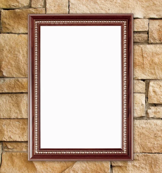 Prázdné dřevěný rám na kamenné zdi — Stock fotografie