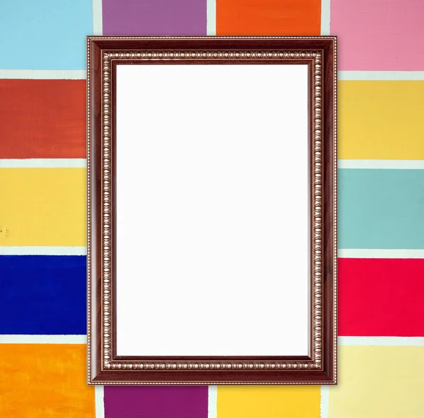 Blank wood frame on colorful wood wall background — Stock Photo, Image