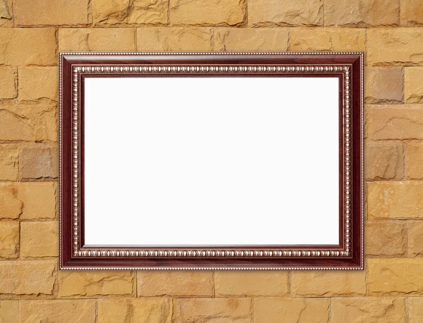 Blank wood frame on brick stone wall — Stock Photo, Image