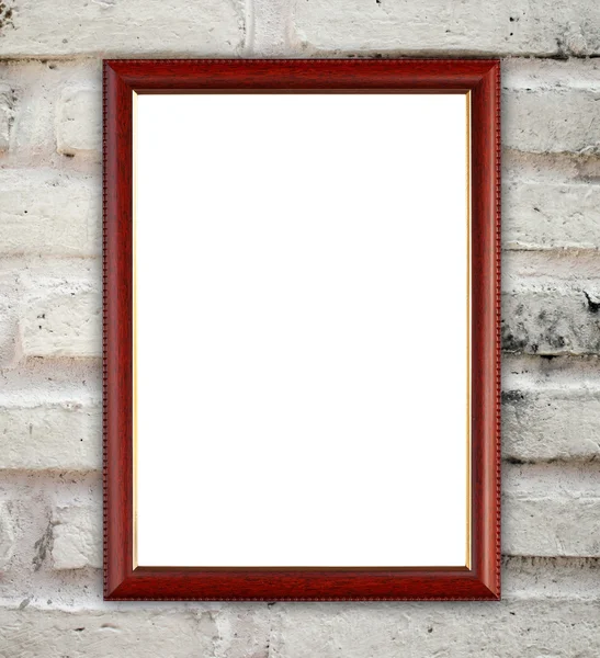 Leeg frame van hout op stenen muur — Stockfoto