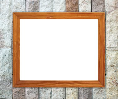 tuğla duvarın üzerinde boş ahşap çerçeve 