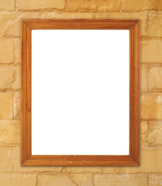 tuğla duvarın üzerinde boş ahşap çerçeve 