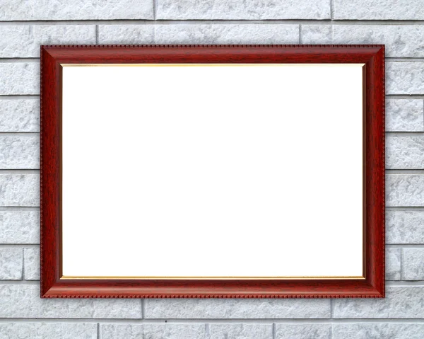 Blank wood frame on brick stone wall — Stock Photo, Image