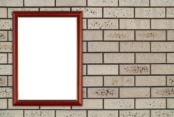 Marco de madera en blanco en la pared de piedra de ladrillo —  Fotos de Stock