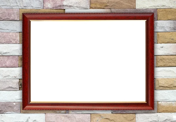 Leeg frame van hout op stenen muur — Stockfoto