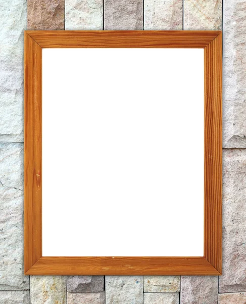 Λευκά ξύλινο πλαίσιο στο πέτρινο τοίχο από τούβλα — Φωτογραφία Αρχείου