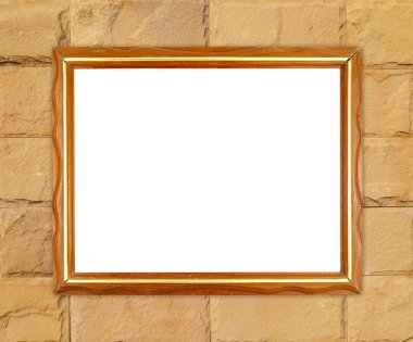 tuğla duvarın üzerinde boş ahşap çerçeve 