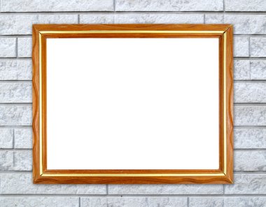 tuğla duvarın üzerinde boş ahşap çerçeve 