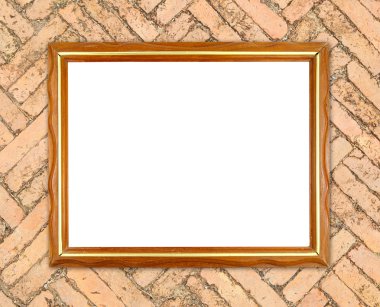 tuğla duvarın üzerinde boş ahşap çerçeve 
