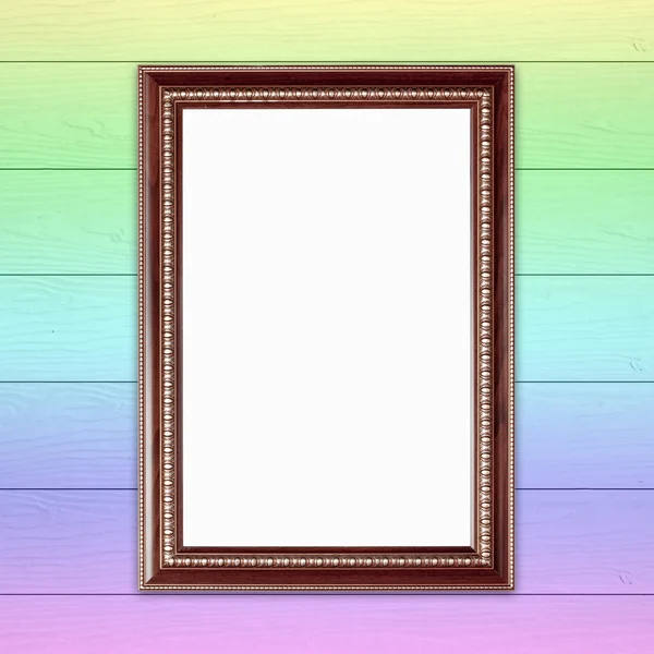 Blank wood frame on colorful wood wall background — Stock Photo, Image