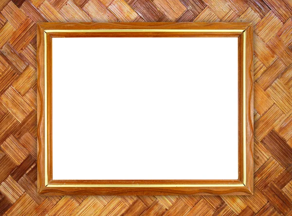 Blank wood frame on bamboo wall — Stock Photo, Image