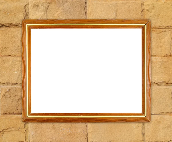 tuğla duvarın üzerinde boş ahşap çerçeve 