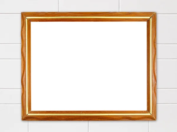 Blank wood frame on stone cement wall — Stock Photo, Image