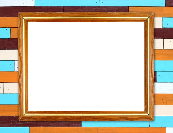 Порожня дерев'яна рамка на барвистому дерев'яному фоні стіни — стокове фото