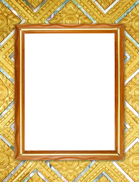 Blank wood frame on Buddha wall — Stock Photo, Image