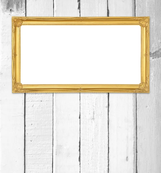 Golden frame on wood wall background — Stock Photo, Image