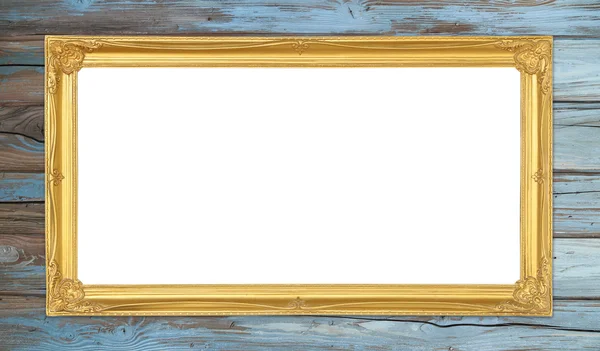 Golden frame on wood wall background — Stock Photo, Image