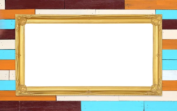 Golden frame on colorful wood wall background — Stock Photo, Image