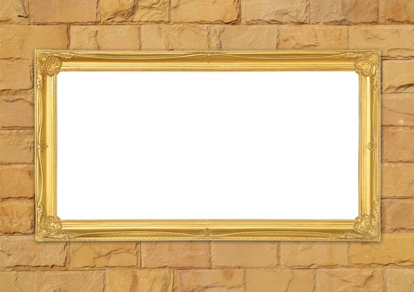 Golden frame on brick stone wall background — Stock Photo, Image