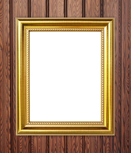 Golden frame on wood wall background — Stock Photo, Image