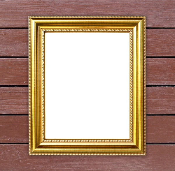 Cornice dorata su fondo parete in legno — Foto Stock