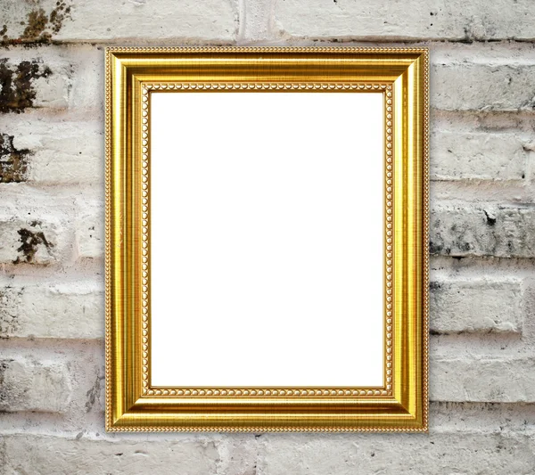 Golden frame on brick stone wall background — Stock Photo, Image