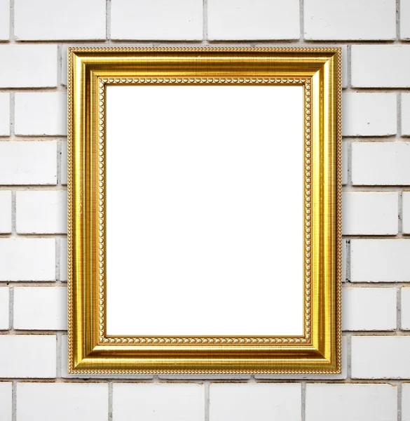 Golden frame on brick stone wall background — Stock Photo, Image