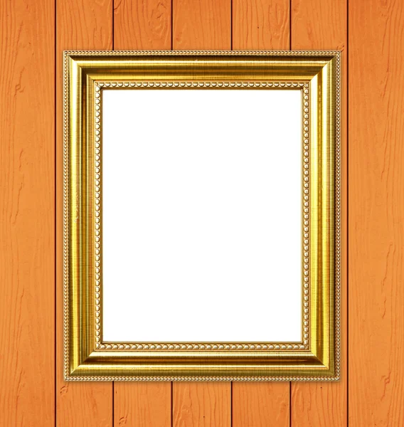 Cornice dorata su fondo parete in legno — Foto Stock