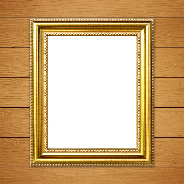 Cornice dorata su fondo parete in legno — Foto Stock