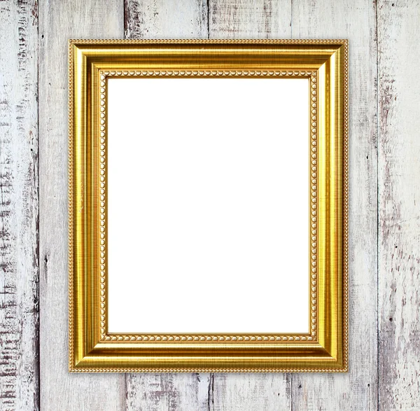 Golden frame on wood wall background — Stock Photo, Image