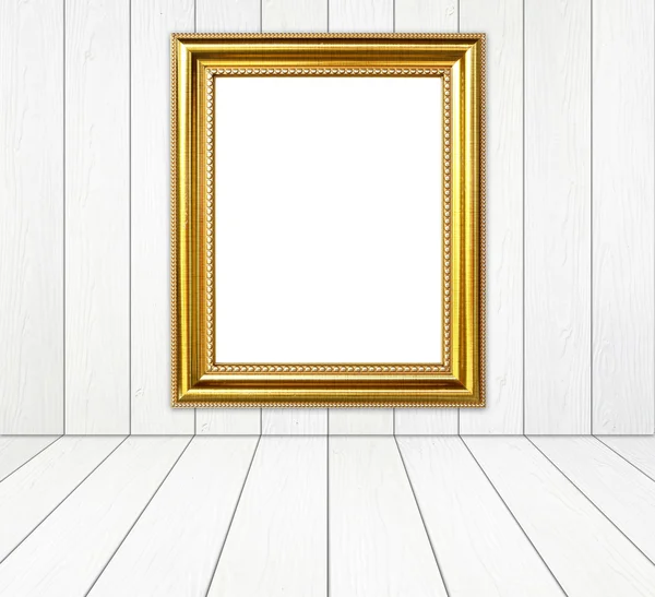 Golden frame in room with white wood wall and wood floor backgro — стоковое фото