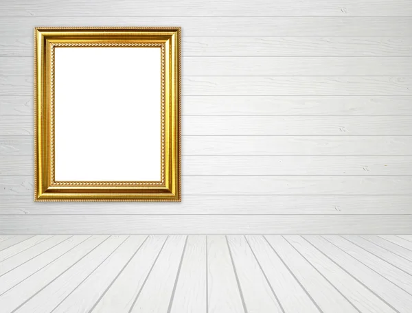 Golden frame in room with white wood wall and wood floor backgro — Stock Photo, Image