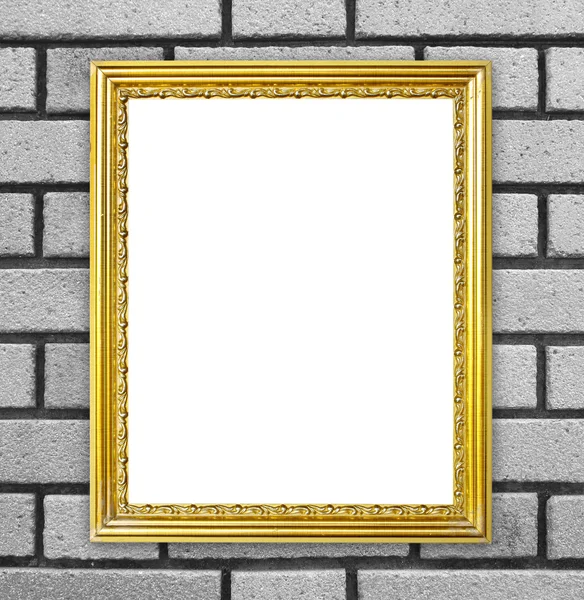 Gouden frame op baksteen stenen muur achtergrond — Stockfoto