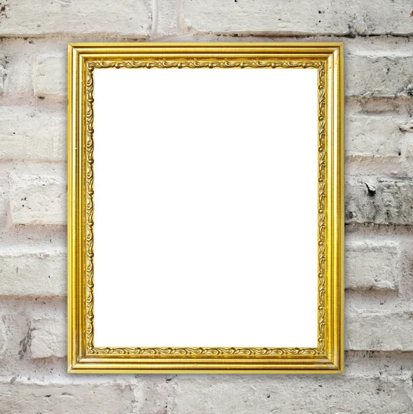 Golden frame on brick stone wall background — Stock Photo, Image