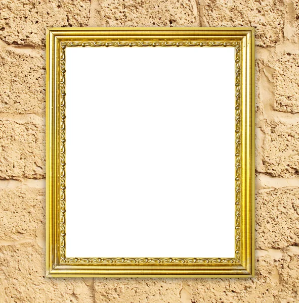 Golden frame on brick stone wall background — Stock Photo, Image