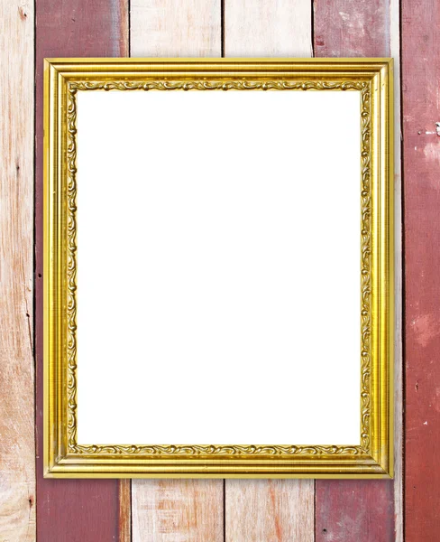 Золотая рамка на фоне деревянной стены — стоковое фото