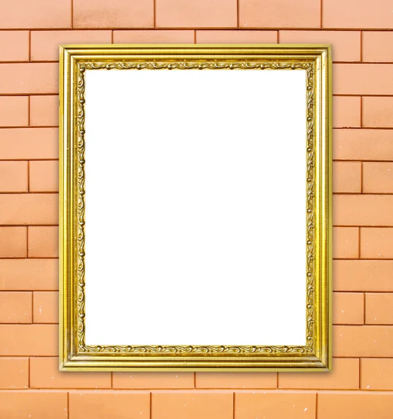 Golden frame on brick stone wall background — Stock Photo, Image