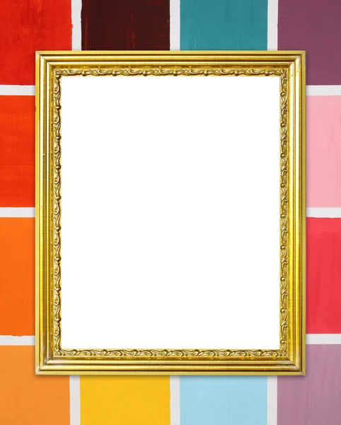 Golden frame on colorful wood wall background — Stock Photo, Image