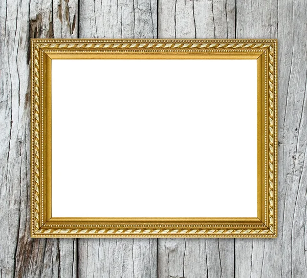 Golden frame on wood wall background — Stock Photo, Image